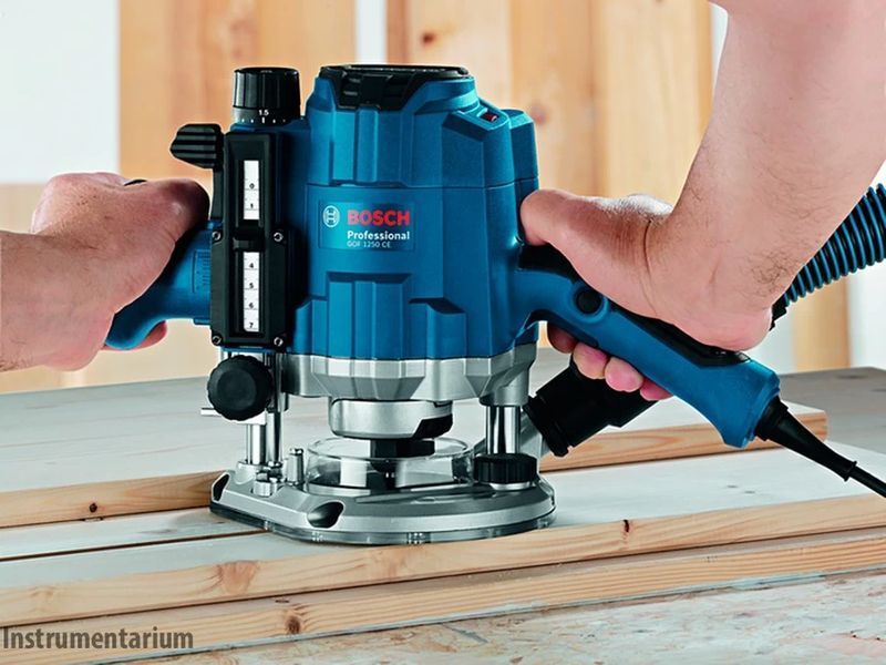 Профессиональный фрезер Bosch Professional GOF 1250 CE : 1250 Вт, патрон 6-8 мм, 24000 об/мин 0601626000 фото