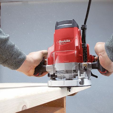 Електричний ручний столярний фрезер по дереву Makita M3600 : 1650 Вт, 12 цанга, 22000 об/хв електрофрезер M3600 фото