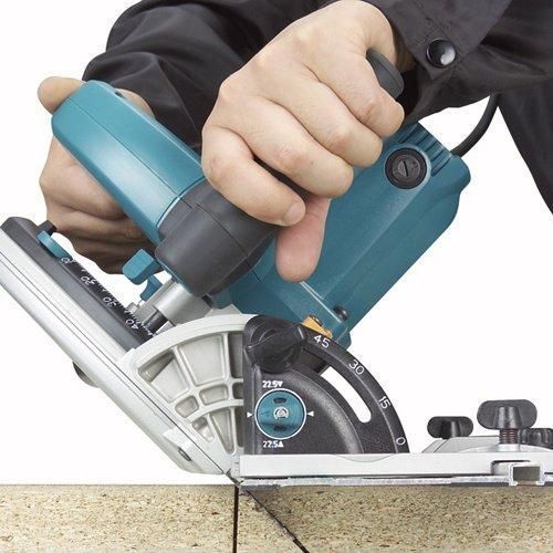 Професійна ручна заглибна дискова пила Makita SP 6000J : 1300 Вт, 165мм, 55мм глибини погружна циркулярка в кейсі SP6000J фото