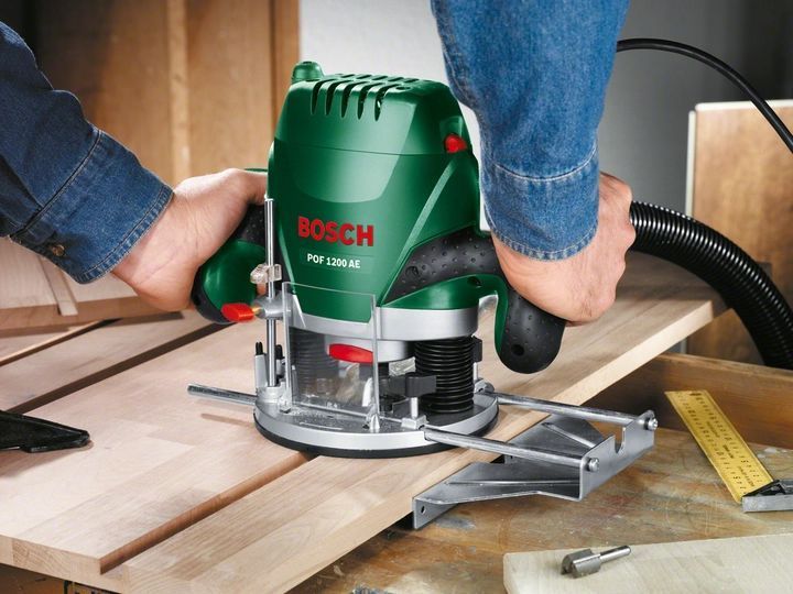 Профессиональный ручной столярный фрезер по дереву Bosch POF 1200 AE: 1200 Вт, 6-8 цанга, 28000 об/мин 060326A100 фото