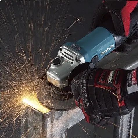 Профессиональная угловая шлифмашина Makita 9558 HNG : 840 Вт, &Oslash; диска 125х22,23 мм, 11000 об/мин 9558HNG фото