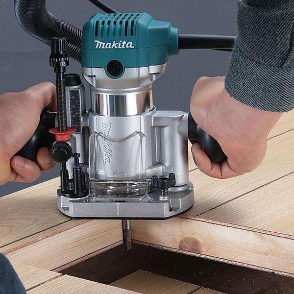 Электрический ручной столярный фрезер по дереву MAKITA RT0700CX2J 710 Вт, 6-8 цанга 30000 об/мин RT0700CX2J фото