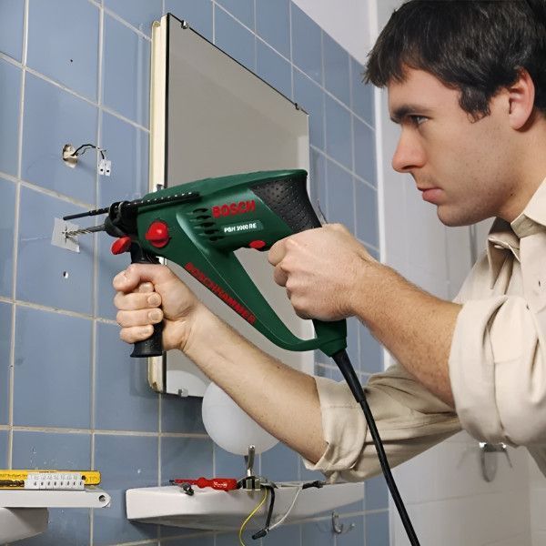 Профессиональный перфоратор Bosch PBH 2000 RE : 550 Вт, 1.5 Дж (06033A9322) 06033A9322 фото