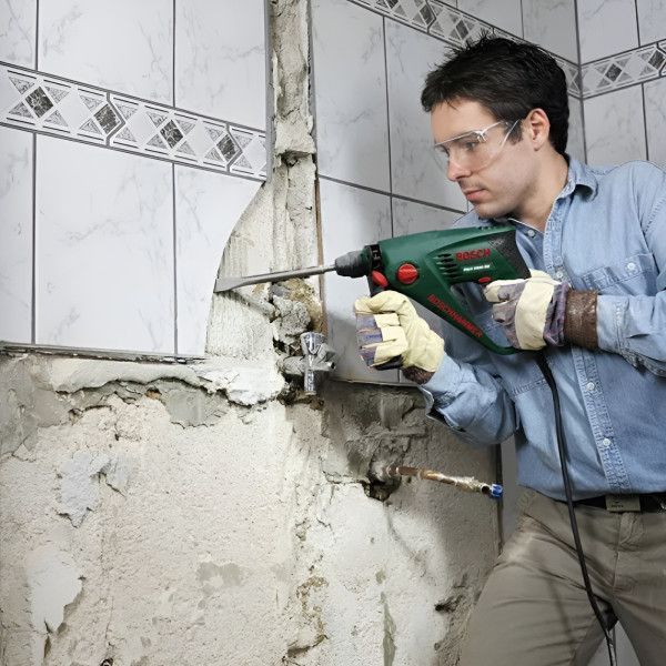 Профессиональный перфоратор Bosch PBH 2000 RE : 550 Вт, 1.5 Дж (06033A9322) 06033A9322 фото