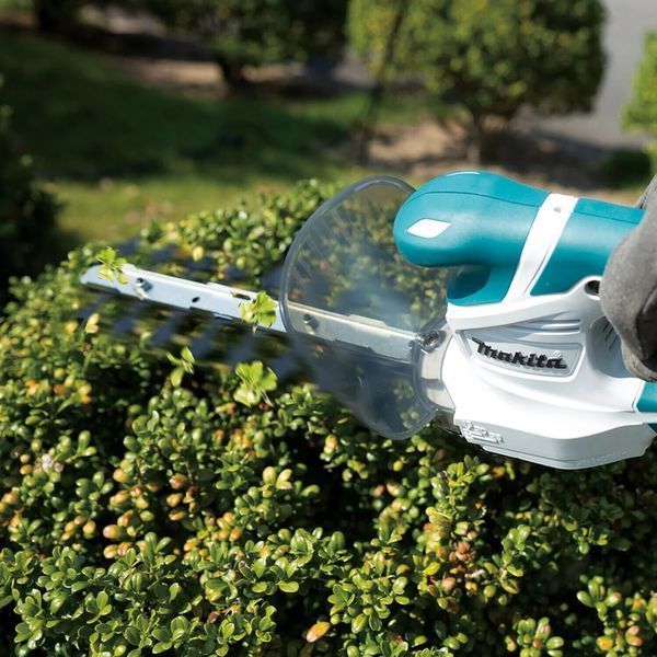 Професійні акумуляторні ножиці-кущоріз G-Series Makita (UM110DWYX) : з АКБ 18V 1.5 Ah, шина кущів/трави 200/110мм, щітковий UM110DWYX фото